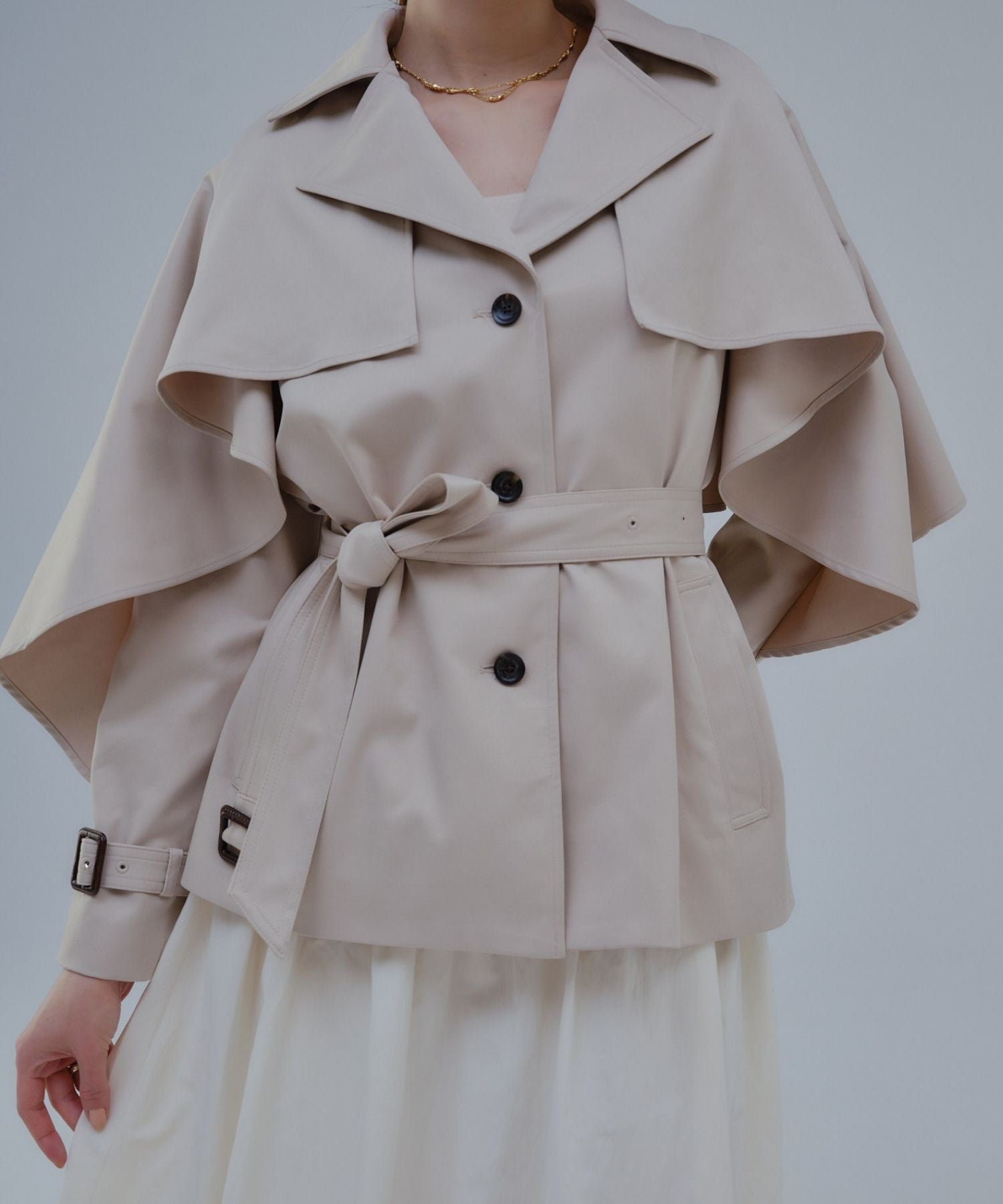 Cape trench coat
