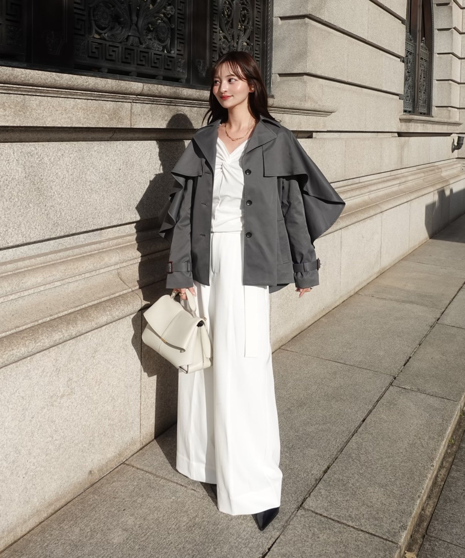 Cape trench coat